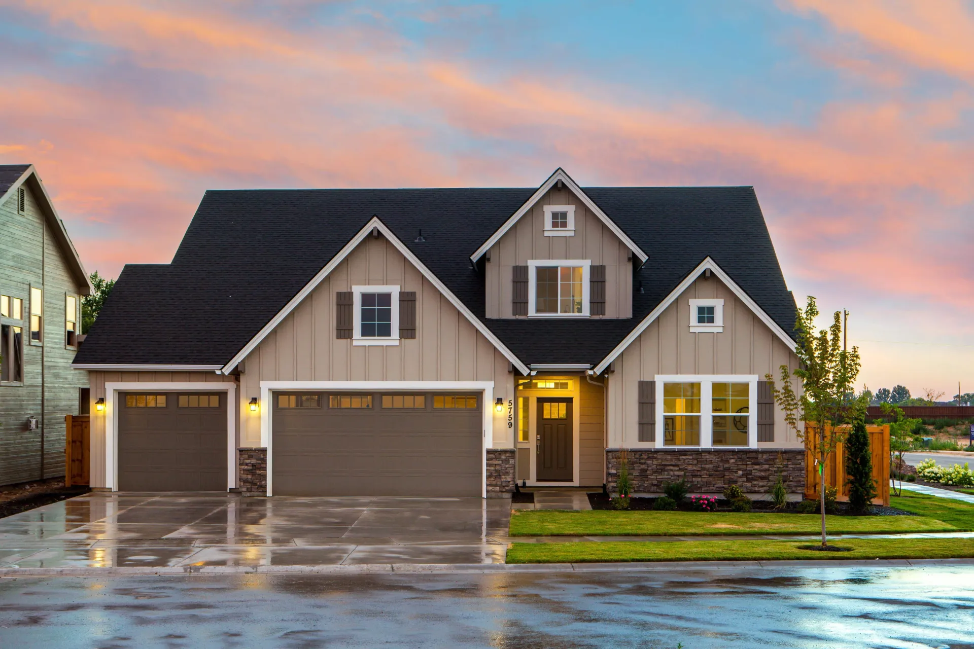 Modern farmhouse exterior at golden hour